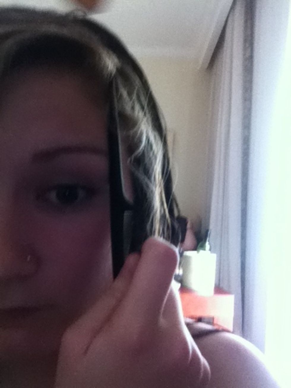 Section side part by going from the end of the eyebrow all the way to the back of the part