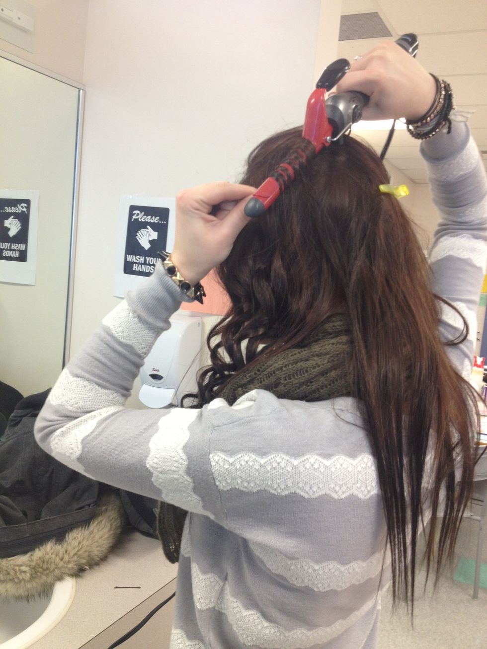 Section your hair into inch and a half sections and curl towards the back of your head
