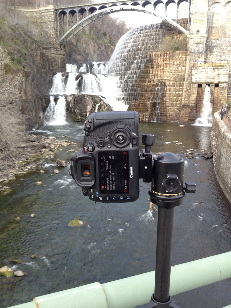 Secure camera on sturdy tripod.