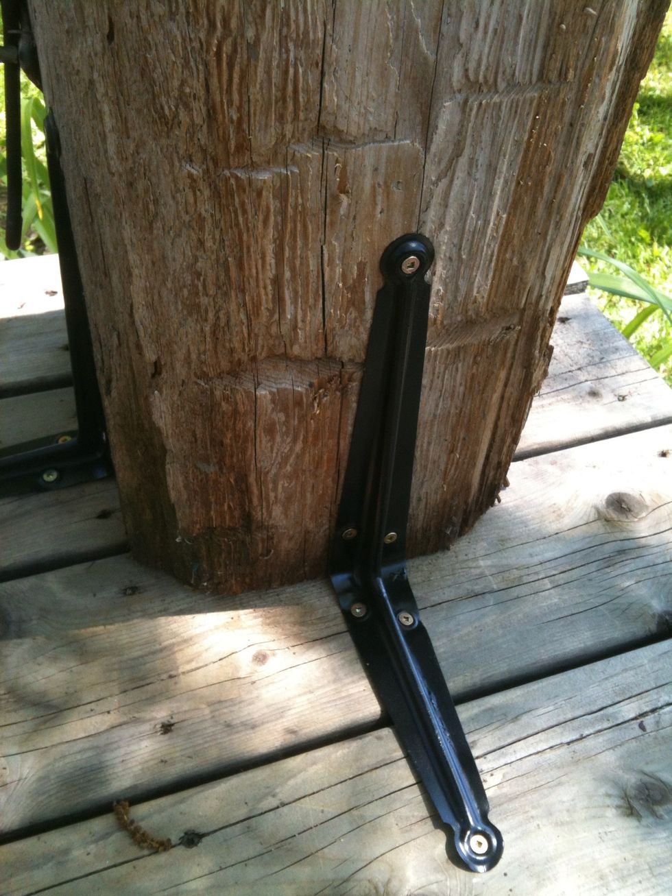 Secure the beam with the 90* brackets to the deck. Make sure that it is sturdy enough for your setting(kids, pets, or drunk friends). This should be enough for our setting.