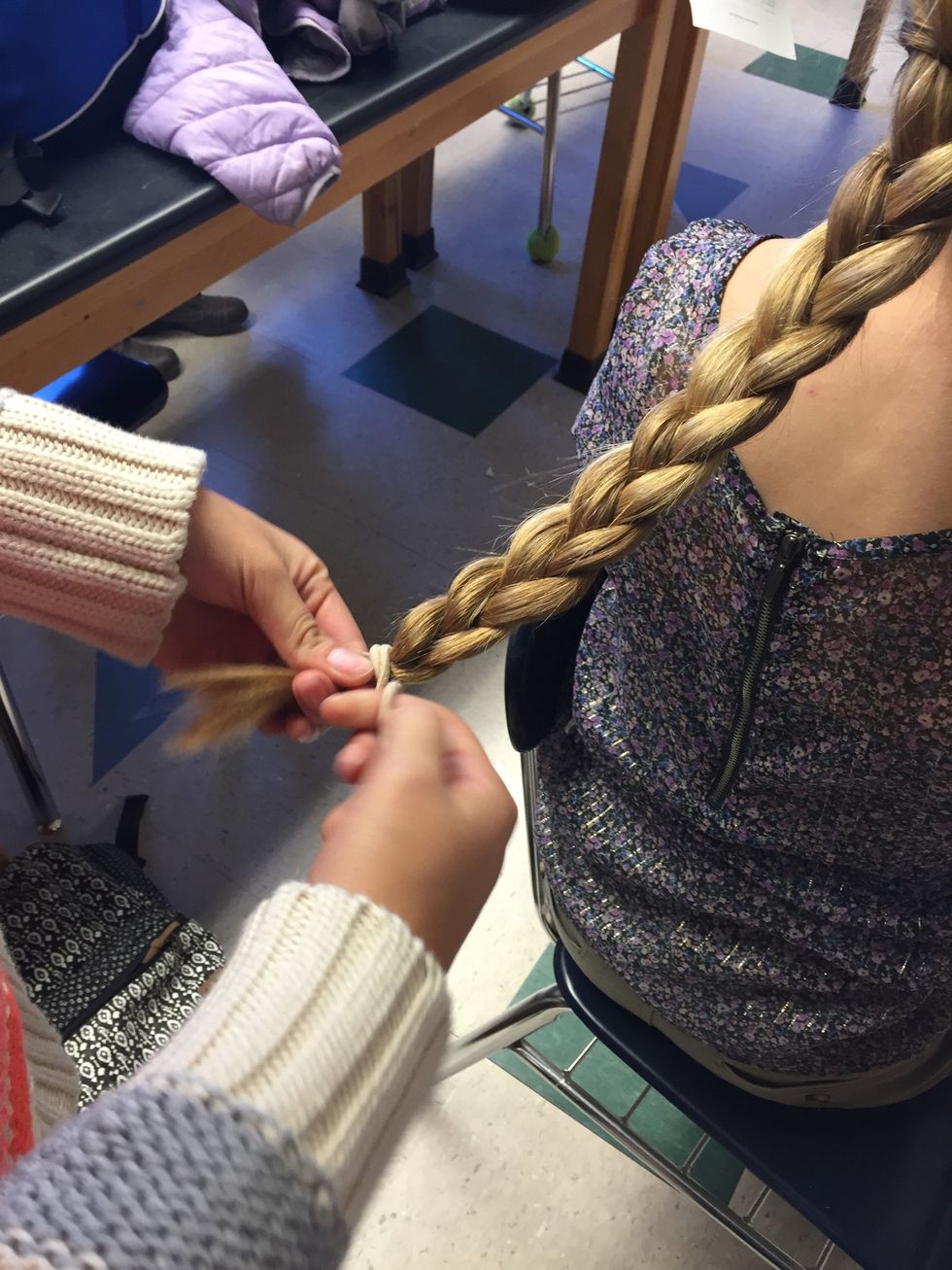 Secure the braid with a hair tie or an elastic