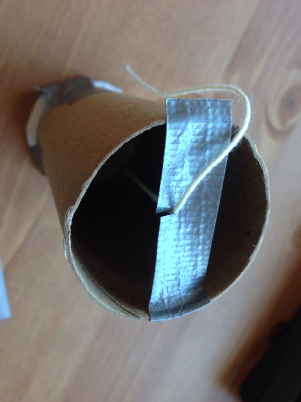 Secure the other side of the wick so it stays straight