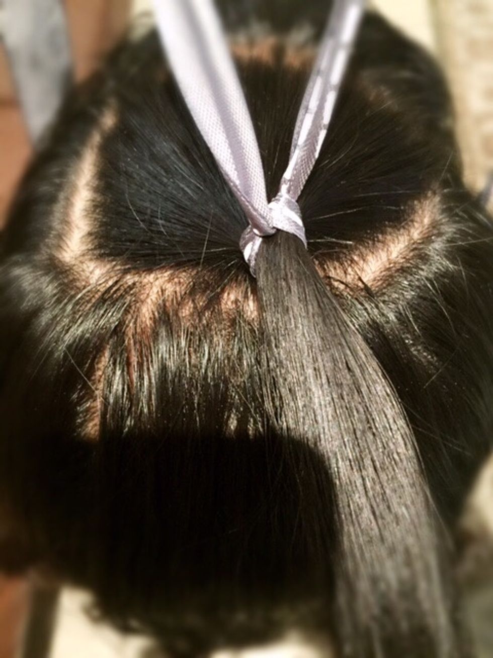 Secure the ribbon with a firm knot.