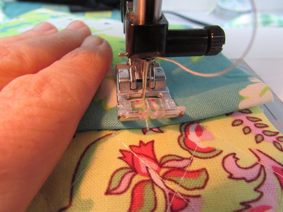 Secure the stitching at the top of the pocket, by reverse stitching a bit aways from the pocket top.