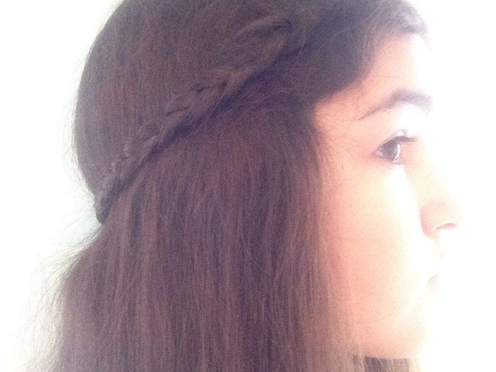 Secure your braid to the back of your head with your pin