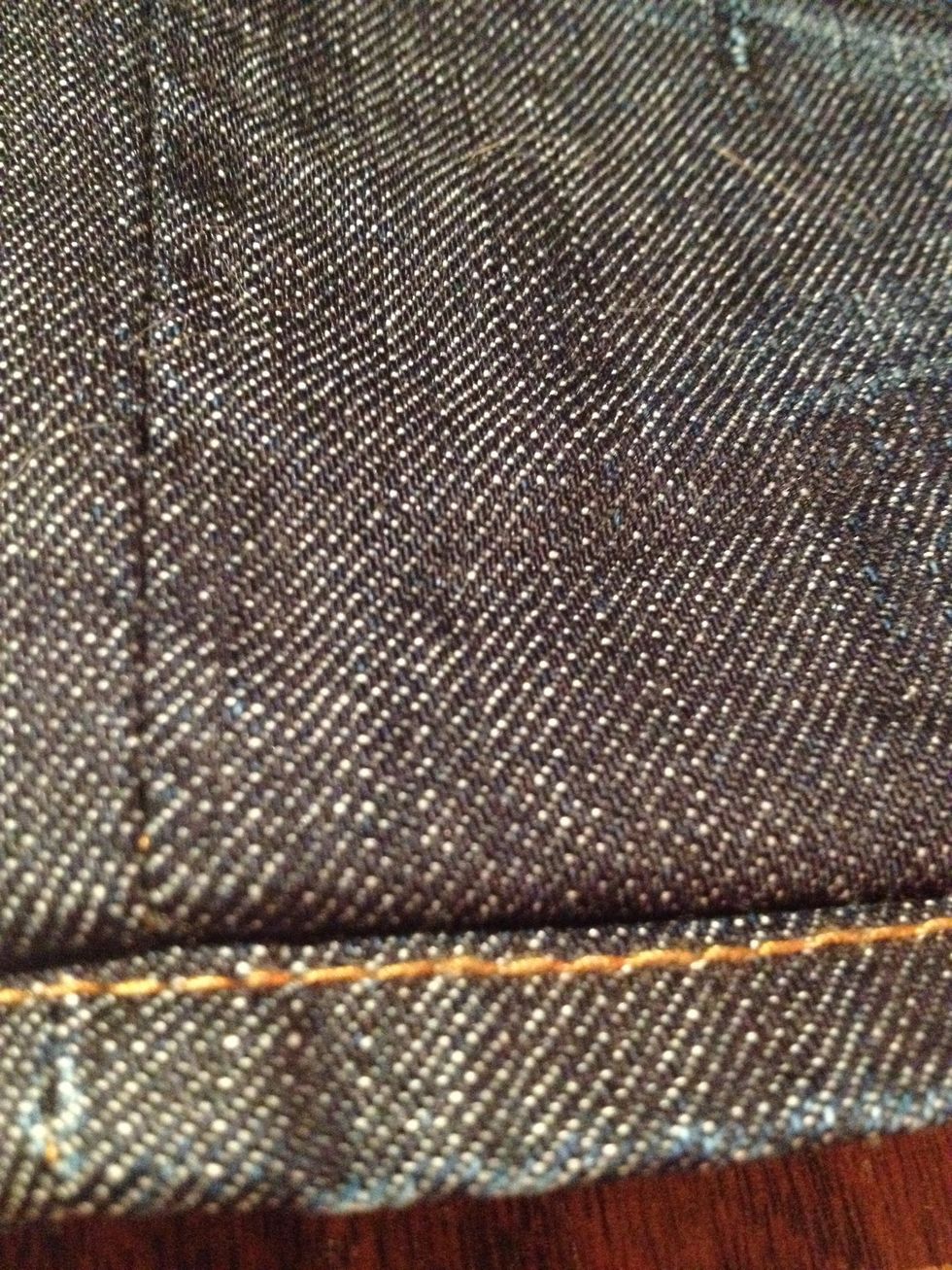 See? All done...like I said, iron it down and no one will really know that there is a seam there. Who really pays attention to hems anyway? Your jeans will just look snazzy and decently "tailored".