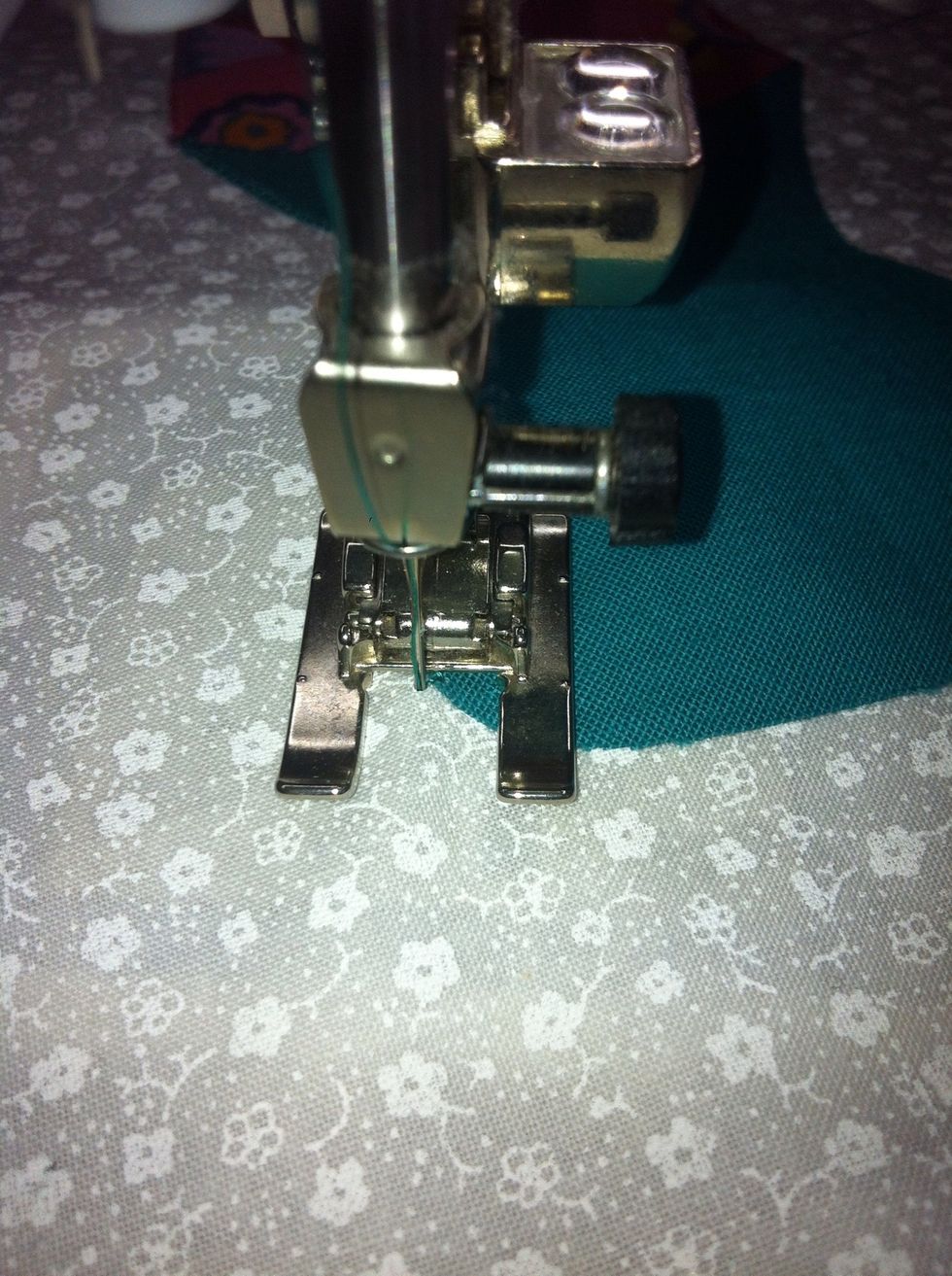 See, here is an outside corner. My needle is down on the outside of the appliqu\u00e9.