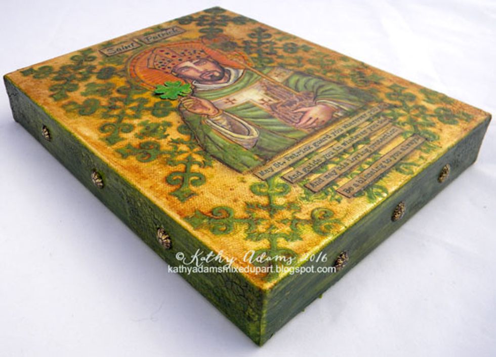 See how great the upholstery tacks look on the sides of this canvas? I love how this turned out. What do you think? Leave me some love below in the comments section!