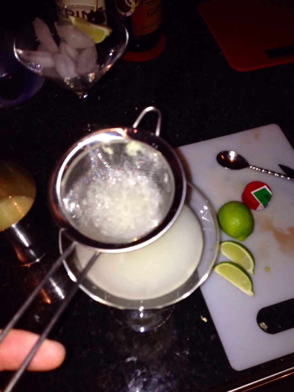 See how the fine strainer catches all the broken ice and lime bits.