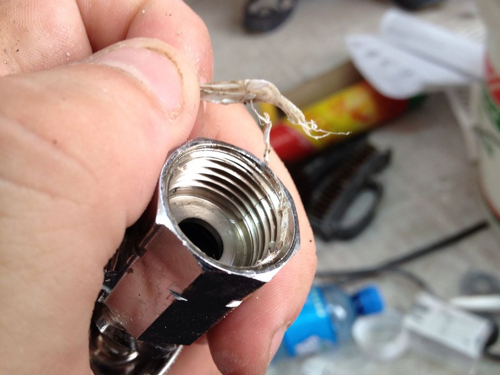 See how the pressure of being smashed between the threads compacts the tape together almost like a bead of caulk?