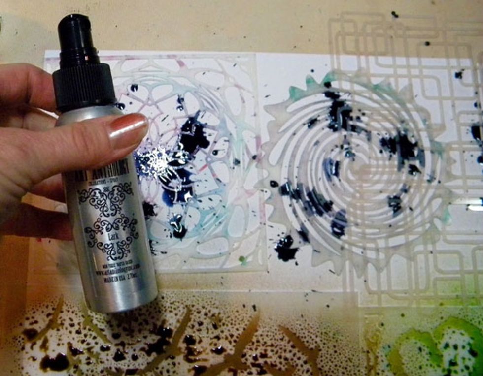 See? I never paint my nails because within hours they are messed up! Anyway, continue spraying Colorations over the stencils. I had a bit of trouble with Lark!