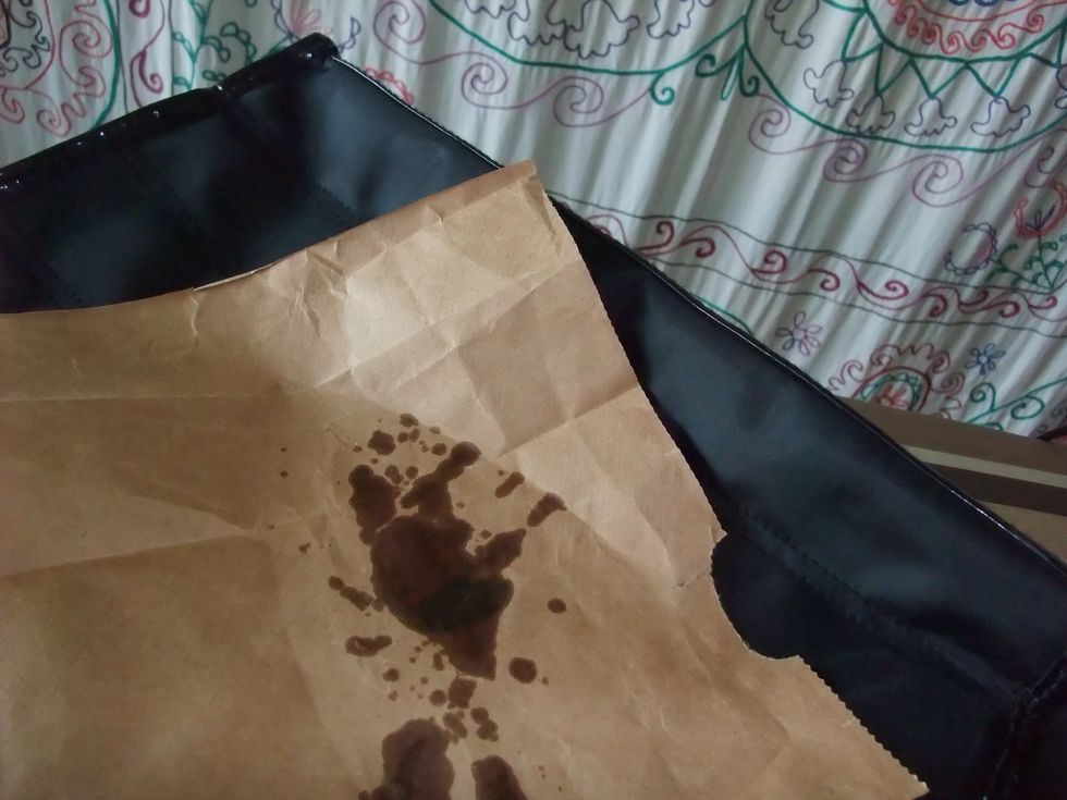 See? Paper grabs wax from fabric.