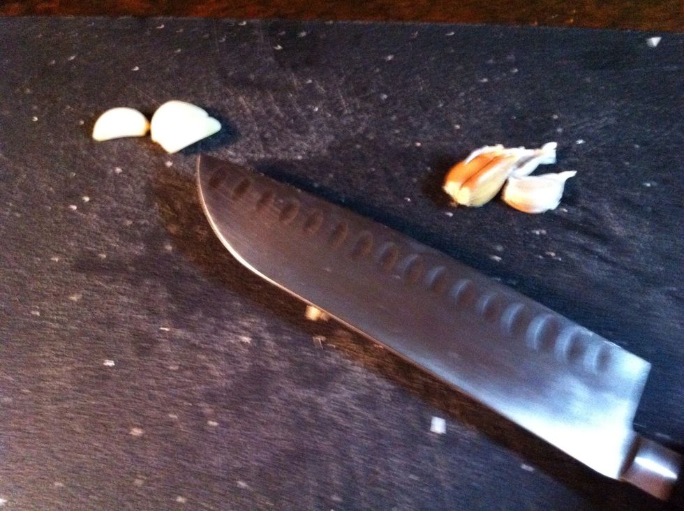 See that spot just over the clove? Place the heel of hand there.