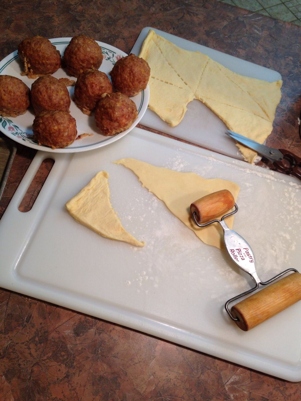 See the larger rolled triangle size (right) compared with original size from package (left) I have a small pizza roller I use.