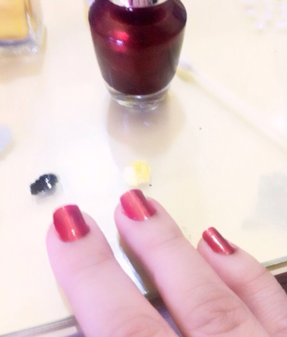 See the photo. About the red nails also use the ear buds (sharp edge) dip in white polish and make dots on the top of the red polished fingers (see photo)