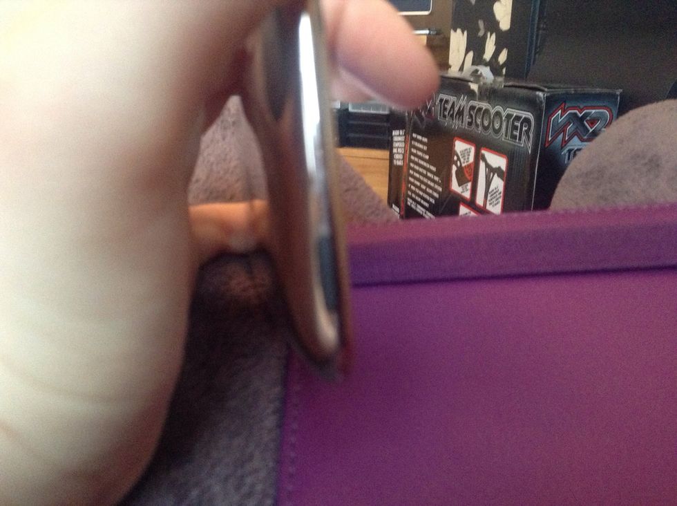 See the power button in black yours might be silver depending on what generation iPod iPhone iPad you have! Press it in!