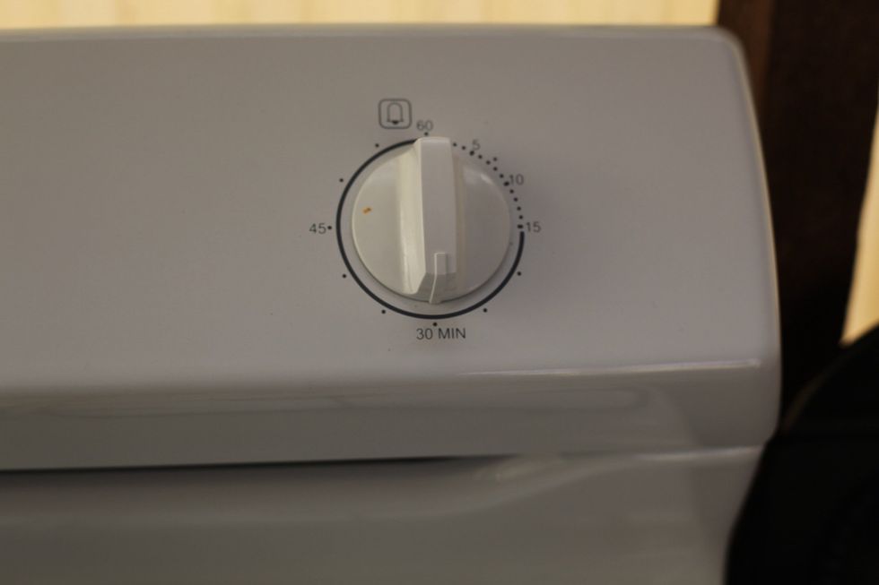 See why we should wash our hands. Spot the carrot on the timer. Hahaha. It was mum I swear lol. Bake for 20-30 minutes on 180 degrees celsius. And are you ready....