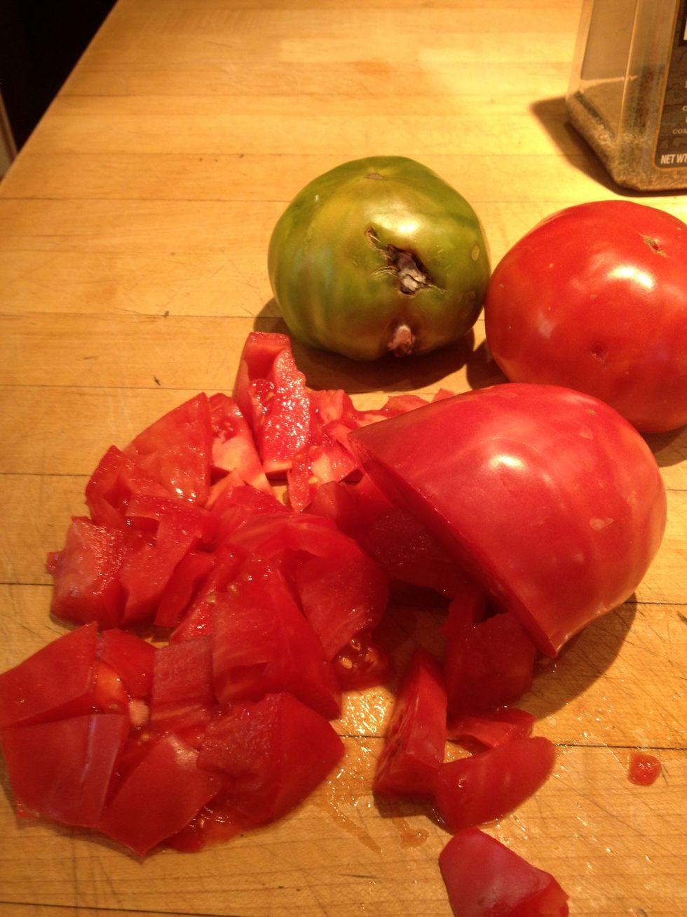 Seed and coarsely chop the tomatoes, separately reserving 1 to 11/2 cups of their juices.