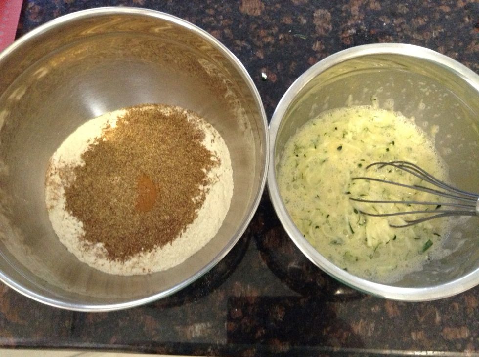 Seen here, Dry & Wet ingredients. Time to combine the two and blend until well mixed with a spatula. Add the wet to the dry ingredients in large mixing bowl.