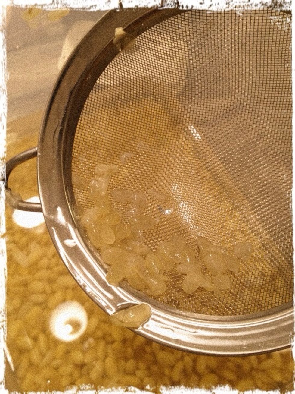 Seive the removed skins from the water