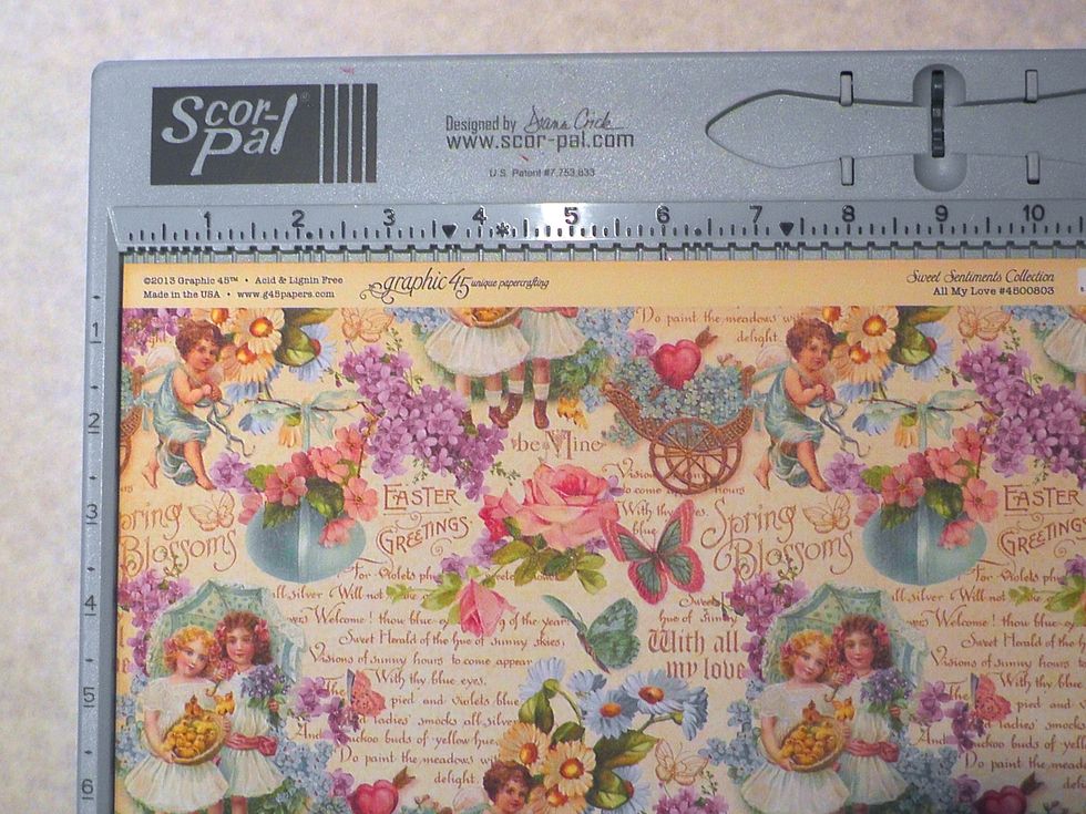 Select a 12x12 sheet of Graphic 45 Paper- here I am using Sweet Sentiments and your Score Board. If you don't have a score board just use a ruler to make your measurements and folds