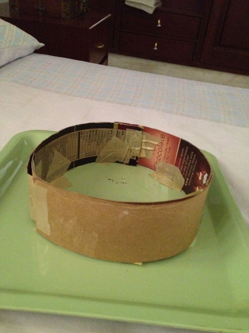 Select a base and tape the circle prepared earlier to the base