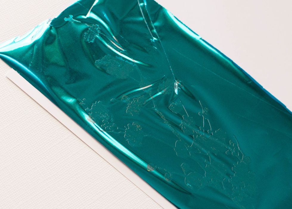 Select a foil color. Place the foil on the rub-on. Be sure to place it color side up. I rubbed the foil with my finger until I saw the shape. Remove foil.