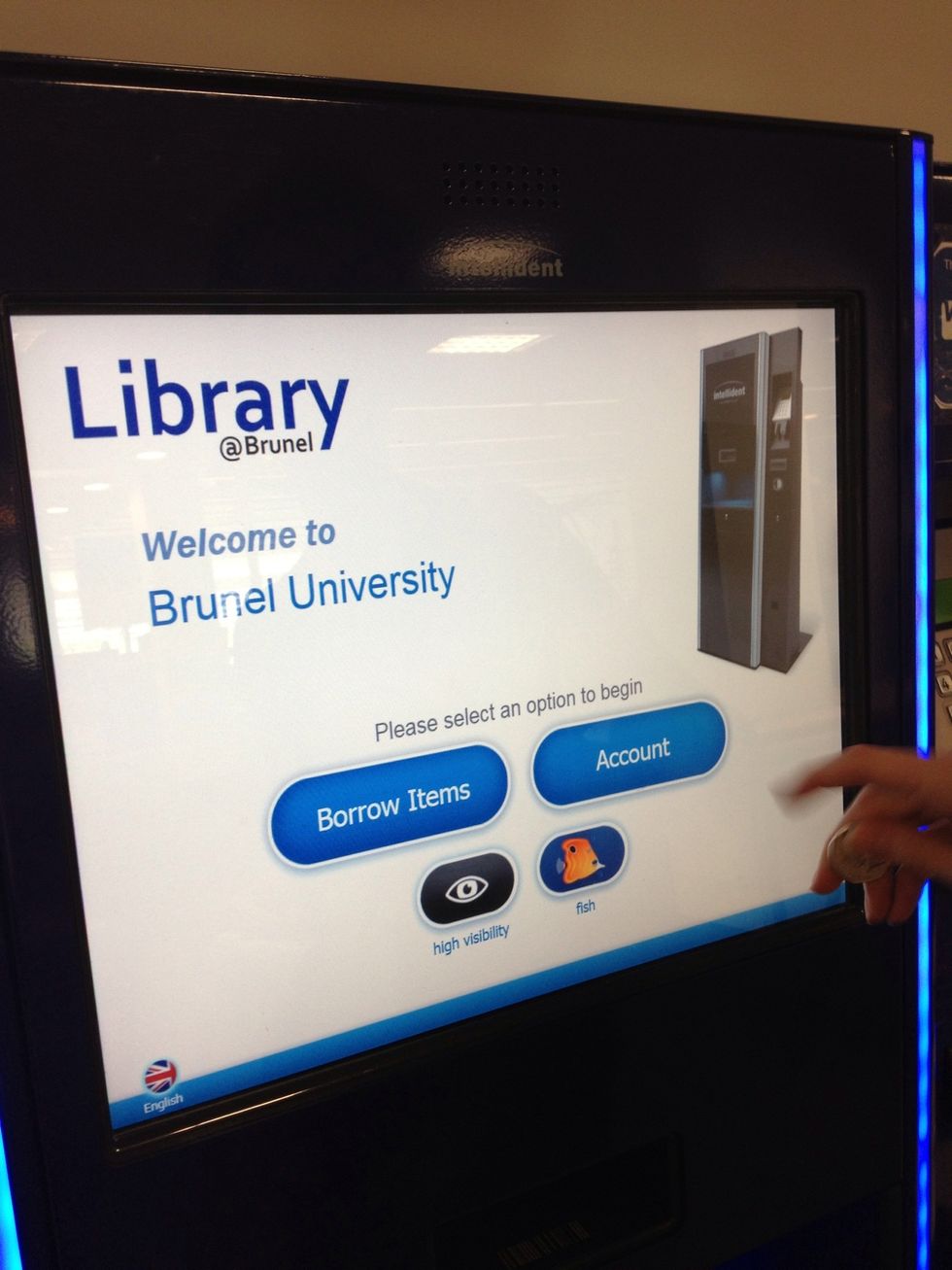 Select 'Account', then place your card in the slot below the screen. Remember, your card can go in any direction, it just needs to touch the base of the reader.