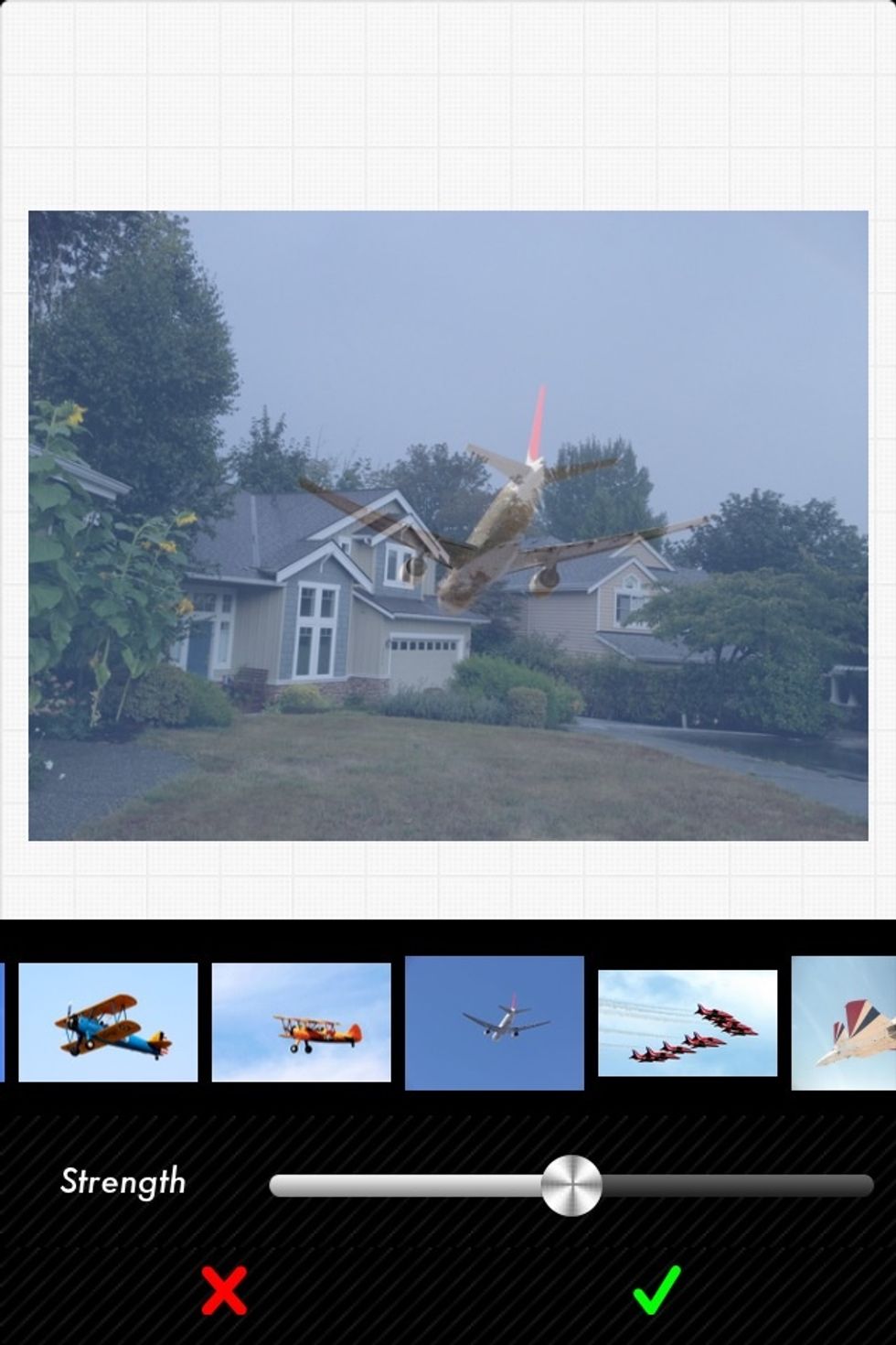 Select 'airplane' effect pack and pick an airplane image, it will appear superimpose on your original picture. Select the green confirm button.