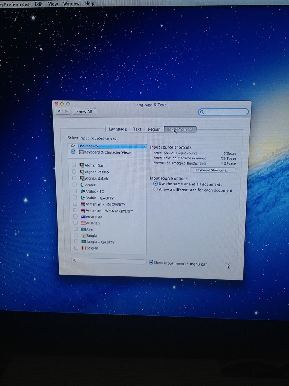 Select Input Menu tab. Tick the 'Keyboard Viewer' box. Tick 'Show input menu in menu bar' box