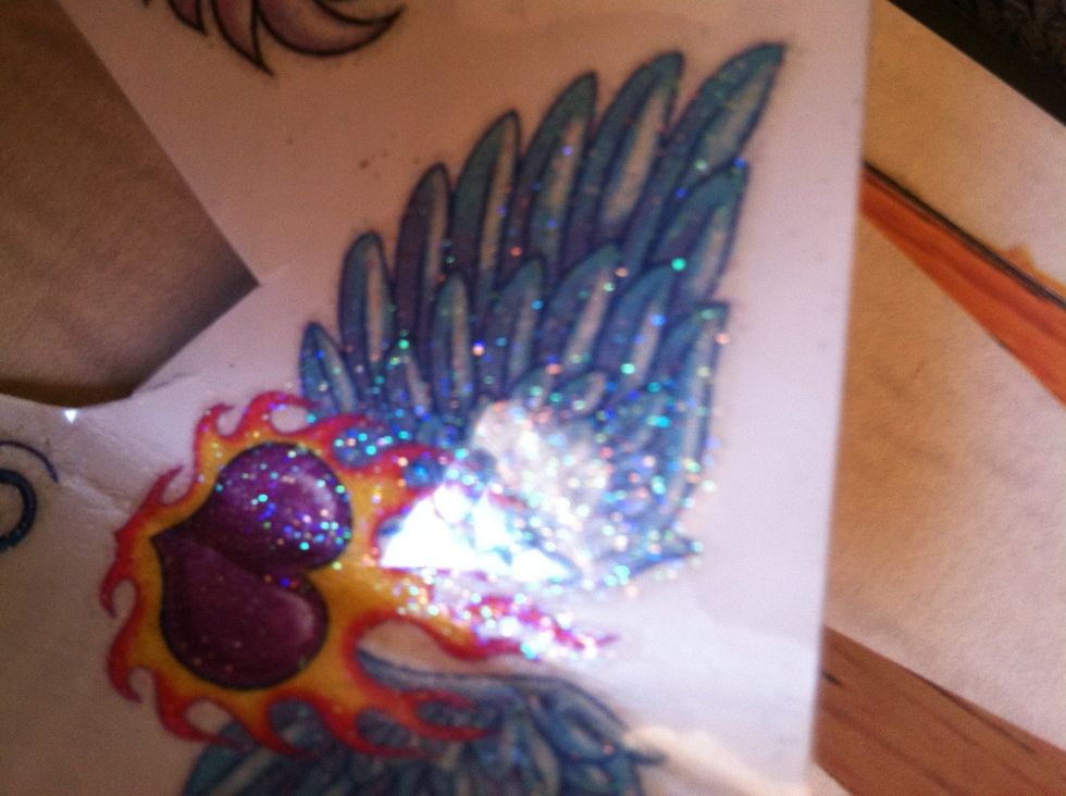 Select old tattoo remember to cut to size but big enough to fit over whole nail!