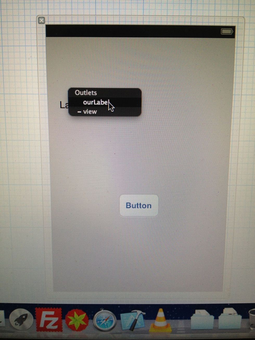 Select "ourLabel" from the litte black Menu. Now we have connected the Label object "ourLabel" with the Label on the User Interface... Every time we use "ourLabel" in Code, we mean this Label now