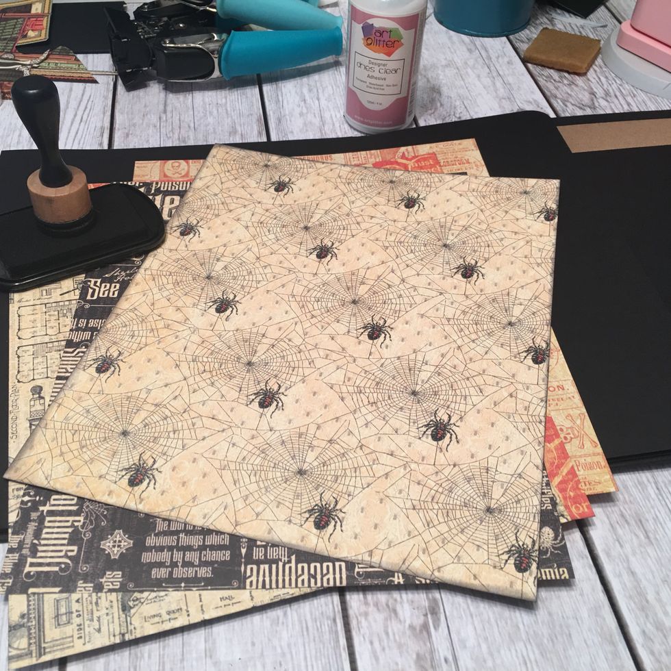Select patterned papers for the pages and flap closure in the 2nd 9" section.