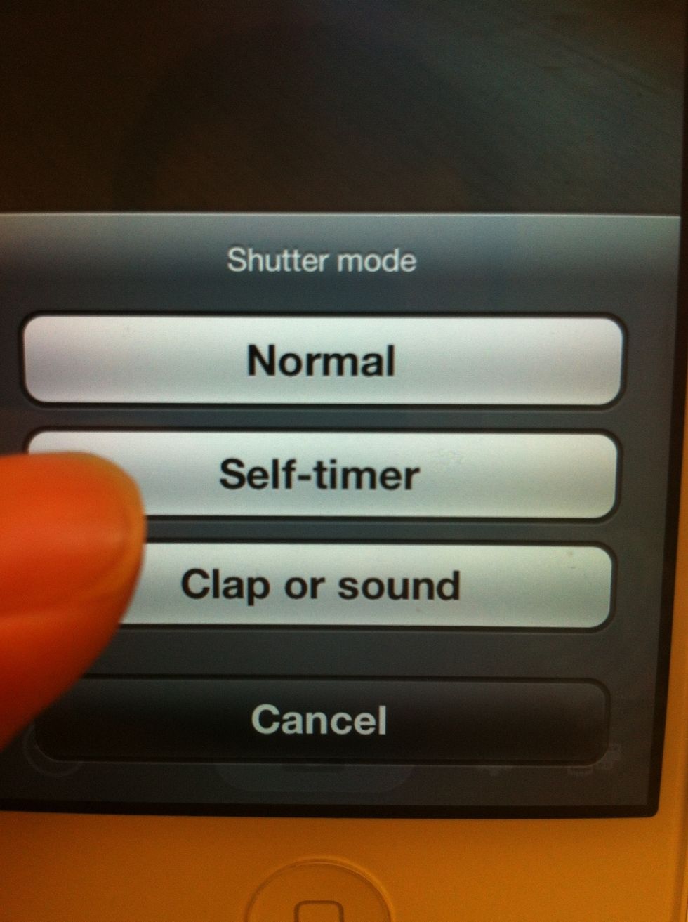 Select self-timer option.