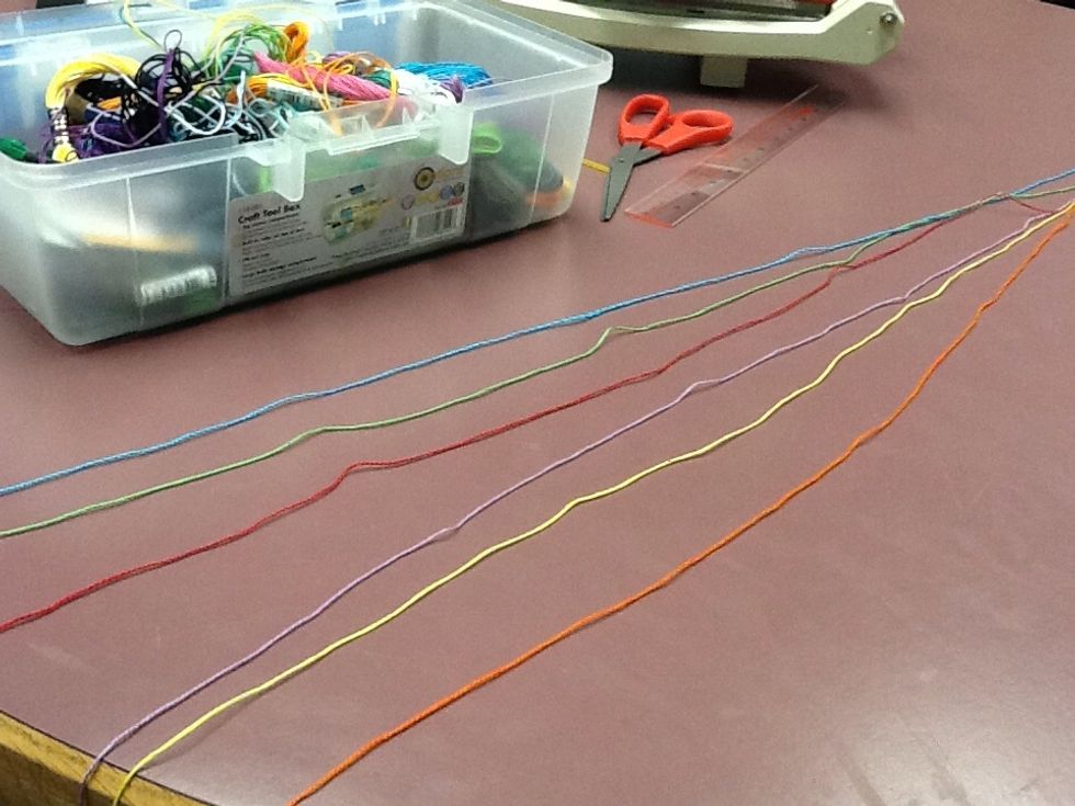 Select six colours of thread, each piece of thread needs to be at least four feet long.