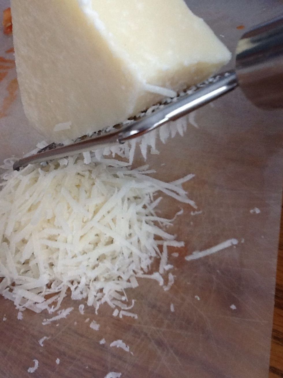 Select the kind of cheese you want and grate it.