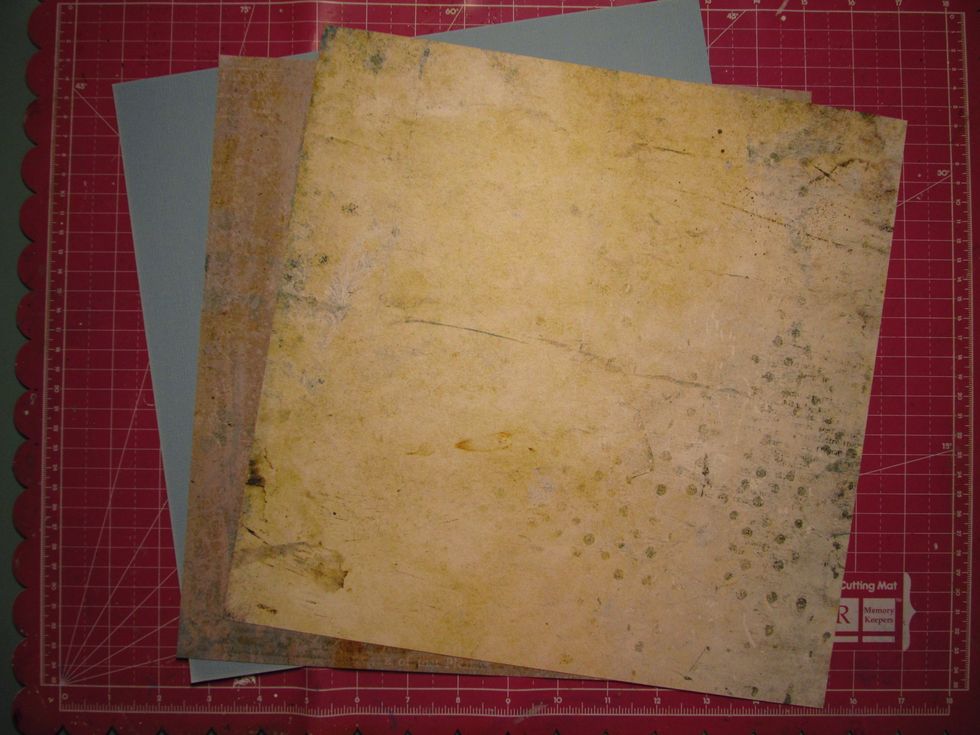 Select the papers you want to use from the kit, along with a sheet of cardstock.