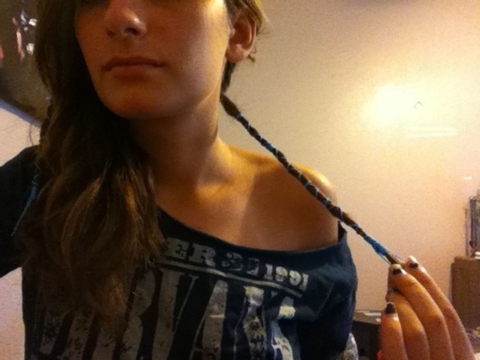 Select your dread and separate it from the rest of your hair