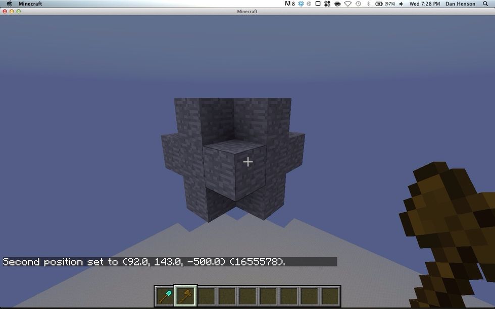 Select your second corner with a right click on the axe.