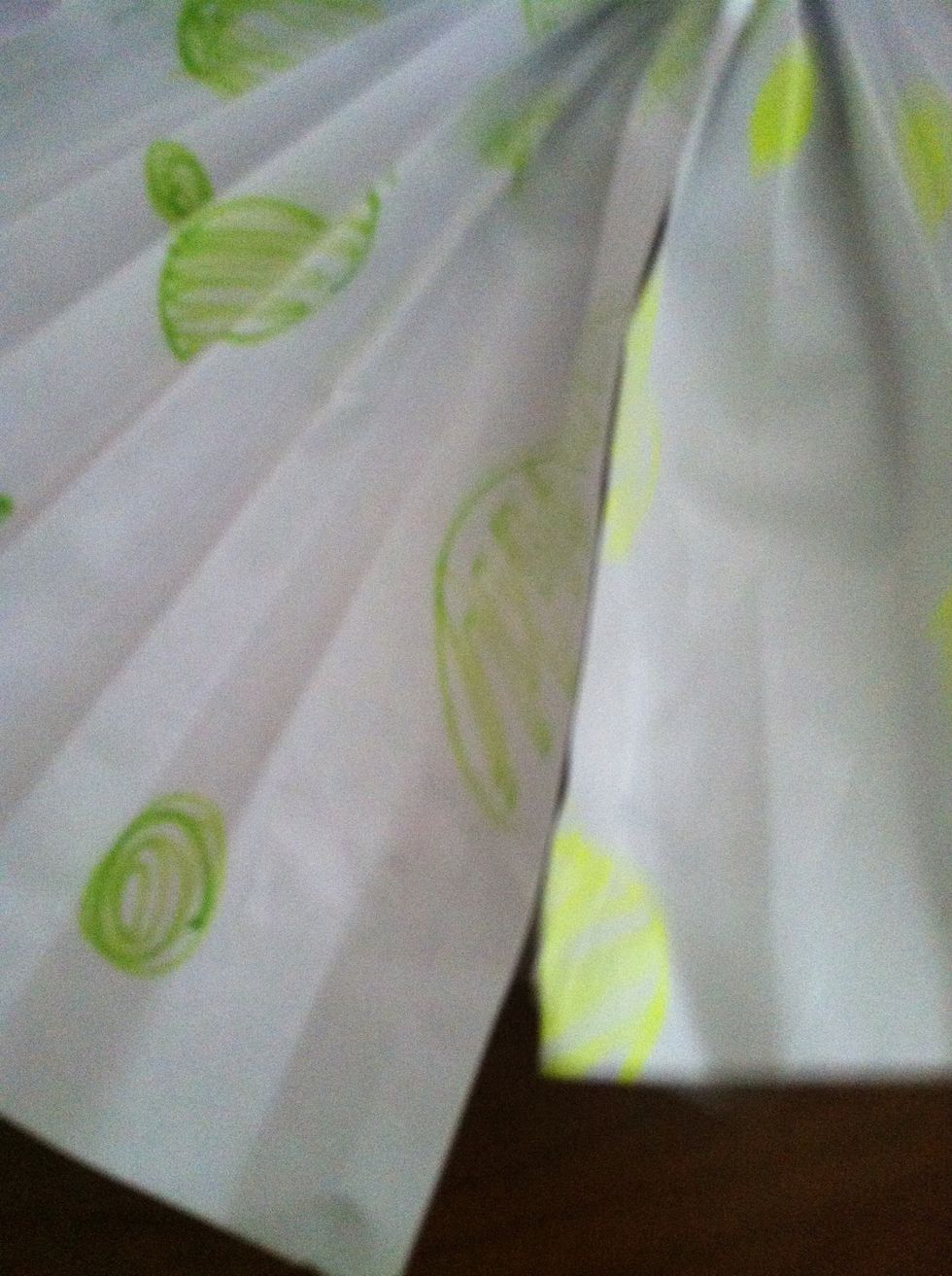 Send stapler and tape them together Staples would look much neater to clear tape also looks good too