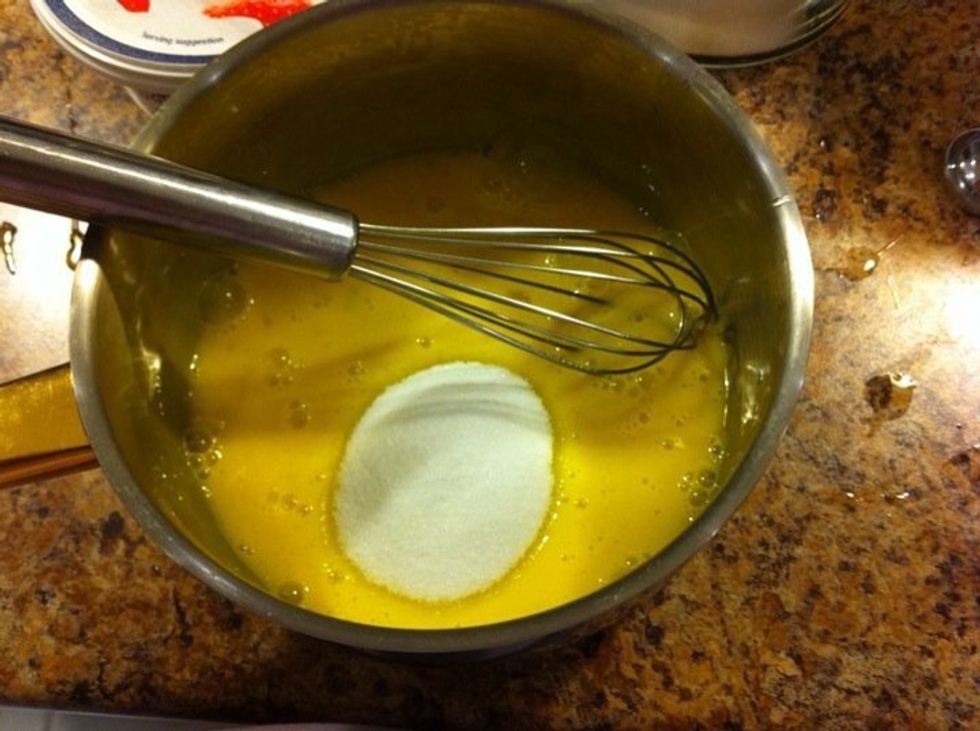 Separate 4 egg yolks and add 4tbs sugar