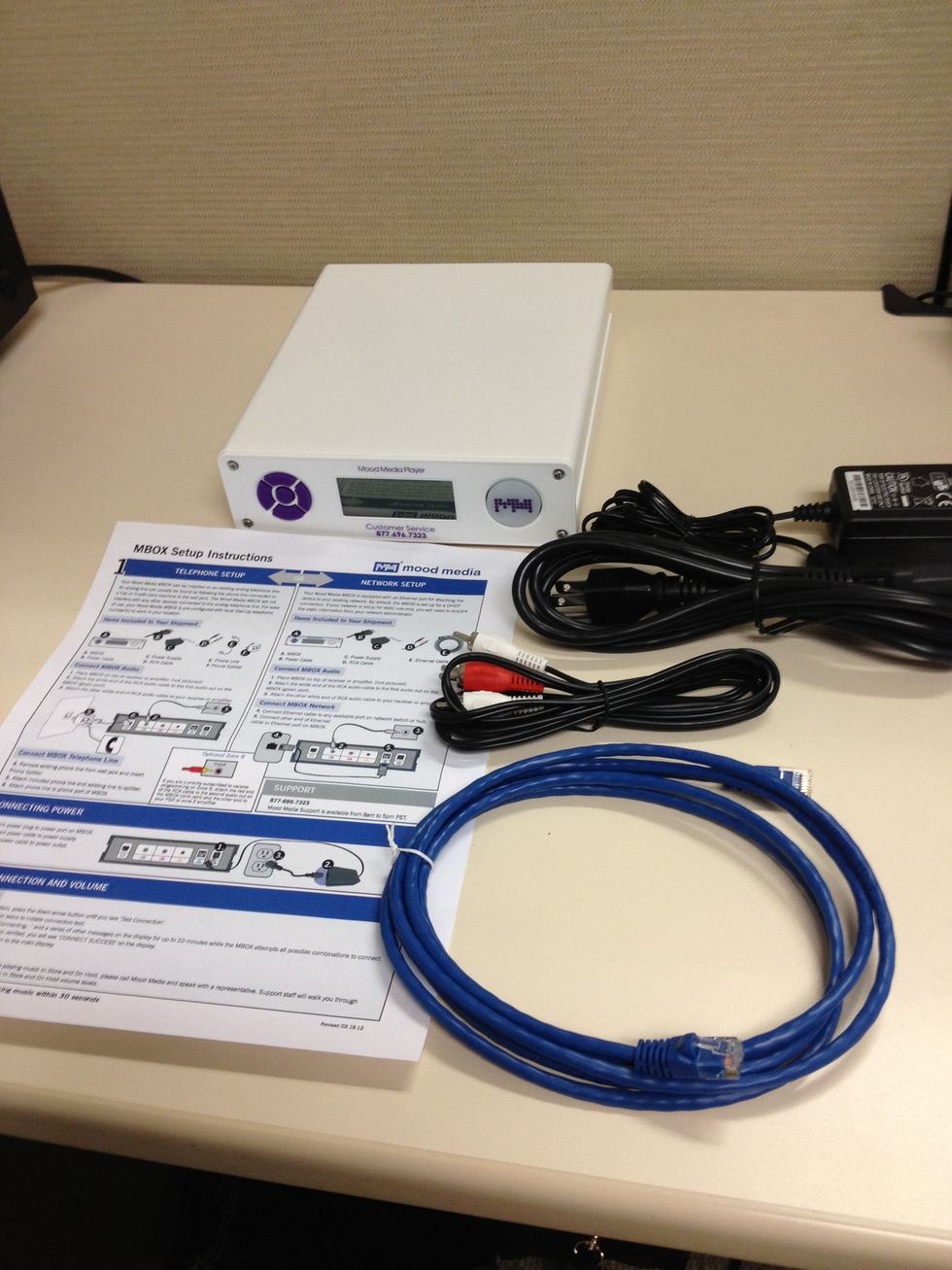 Separate and identify each part. You should have the MBOX, a network connection cable, audio connector and power supply with cable. You will also have a detailed installation guide.