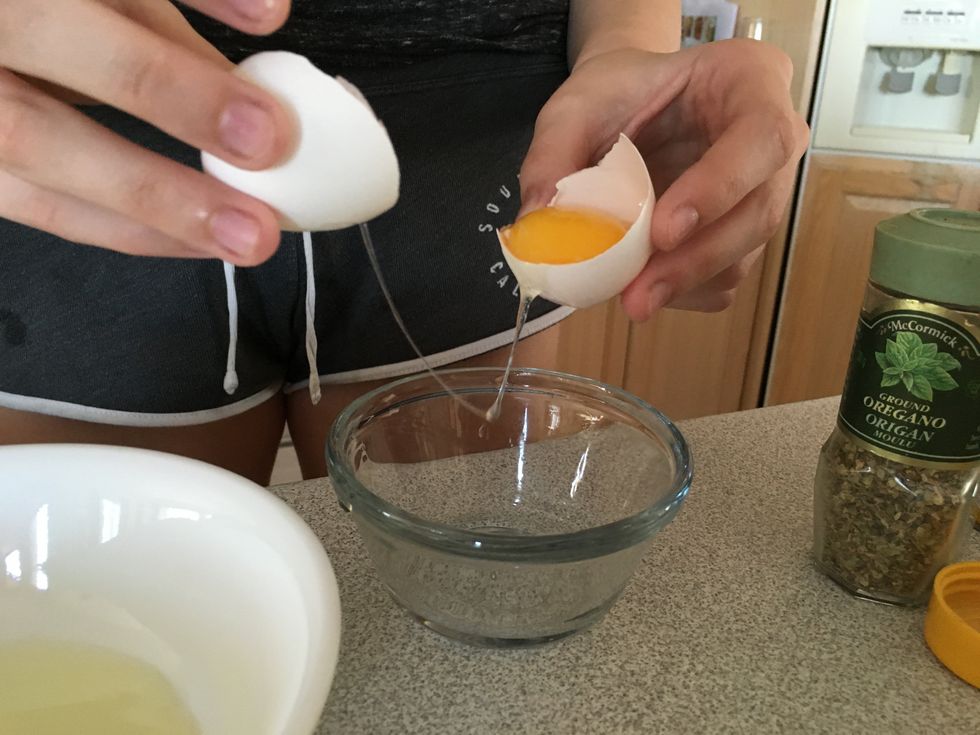 Separate egg whites and egg yolks, put egg whites in a bowl big enough to be used for coating chicken breasts