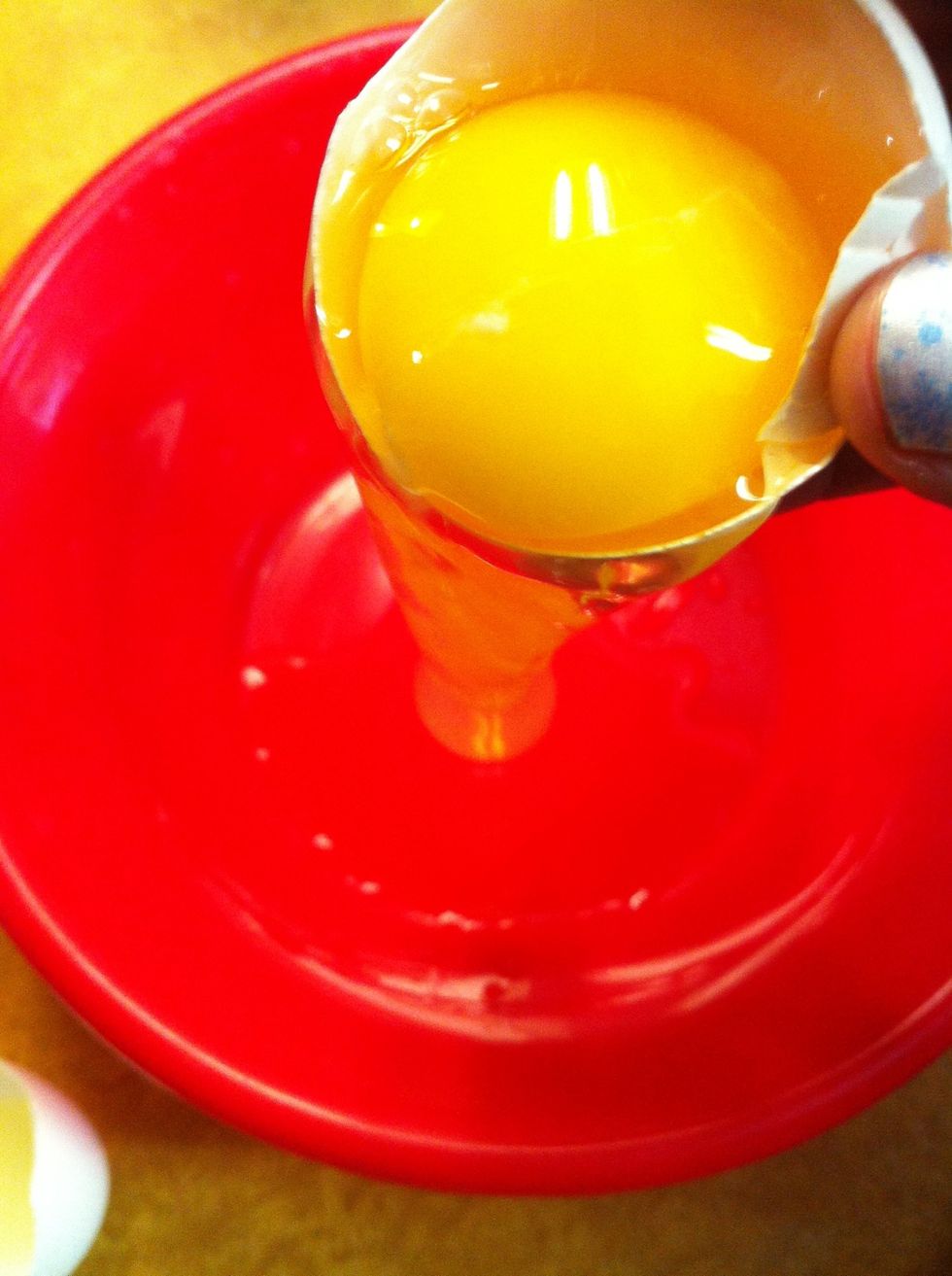 Separate  egg yolk from egg whites