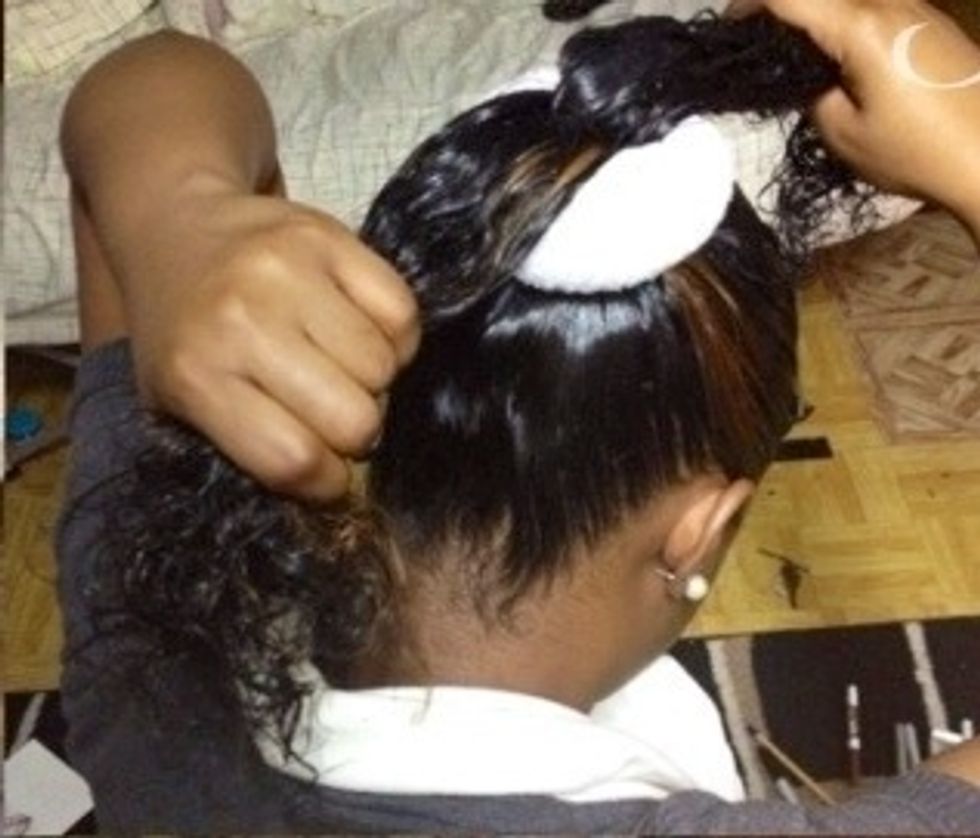 Separate hair into 2 parts.