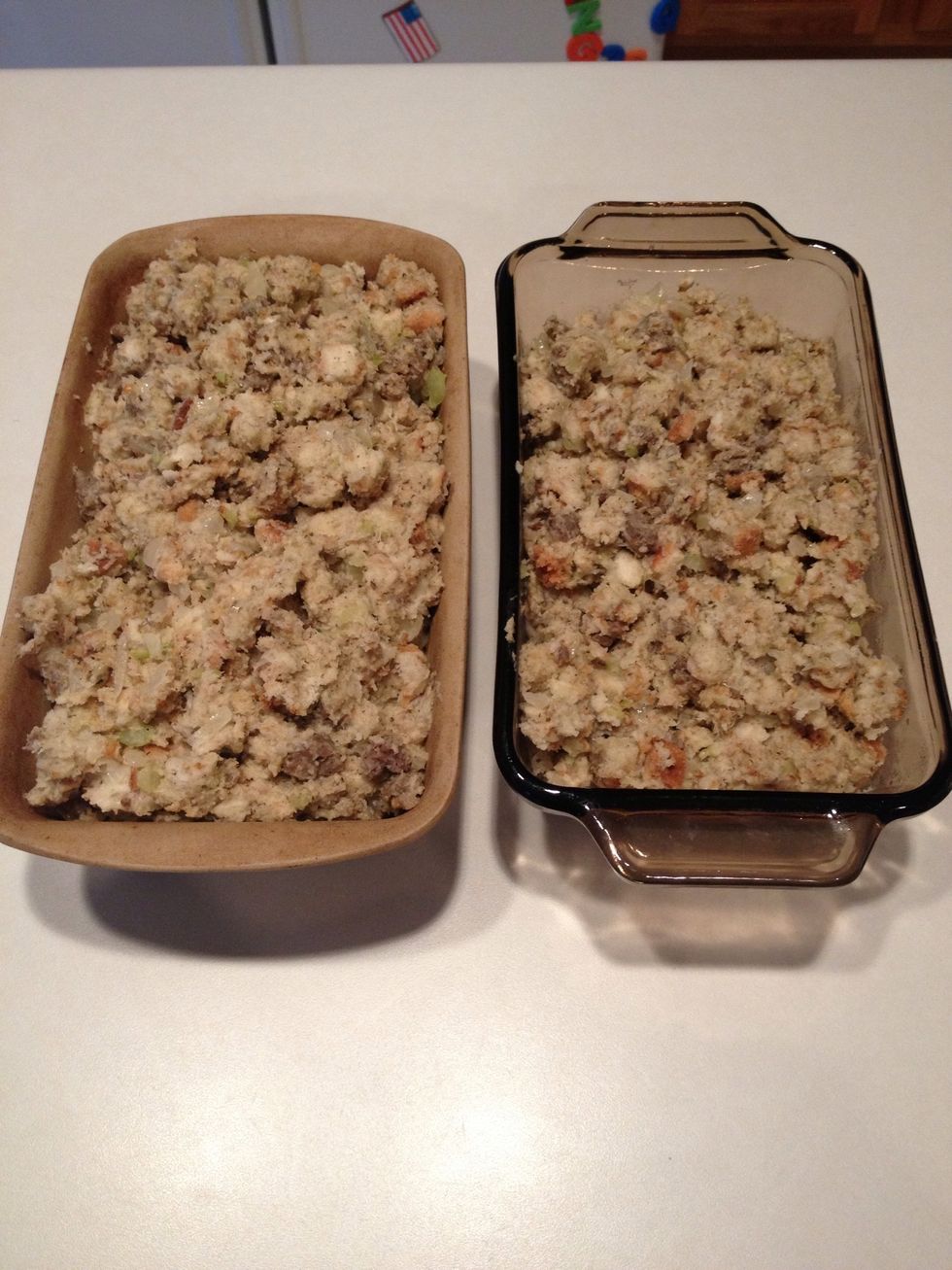 Separate stuffing into two separate bread pans.  Freeze one for future use!  Cover the other one with aluminum foil and place in the oven.