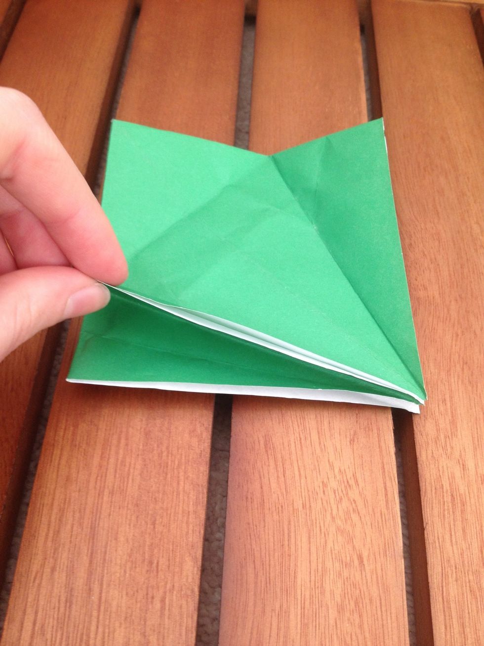 Separate the bottom left corner from the corner underneath it.