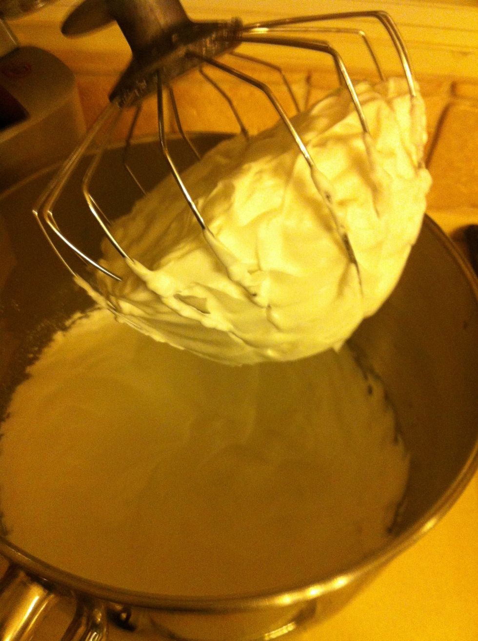Separate the egg whites from the yoke and whisk the whites with the sugar to a firm foam