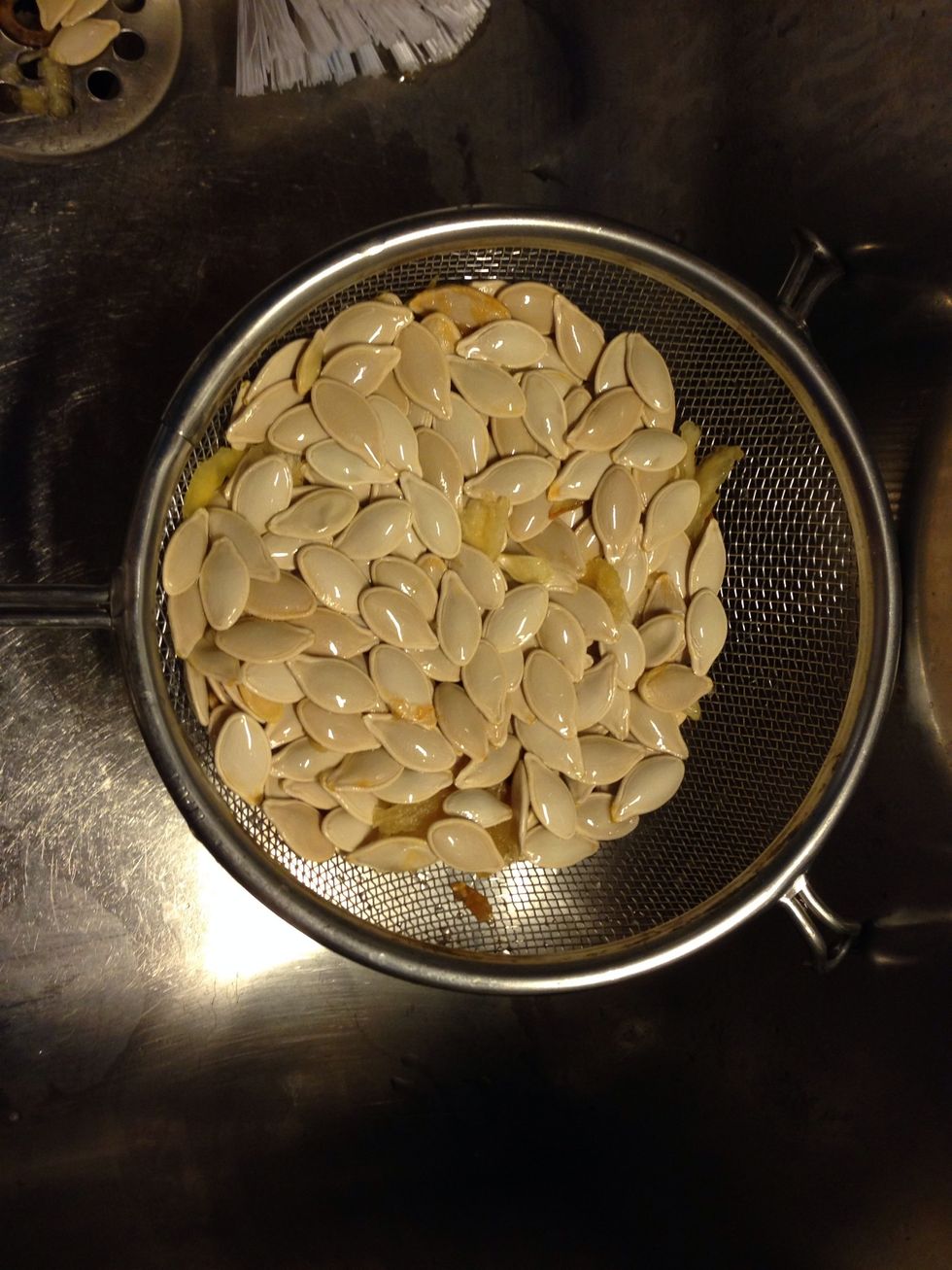 Separate the meat from seeds.  Note: see my guide on pumpkin seed snack.