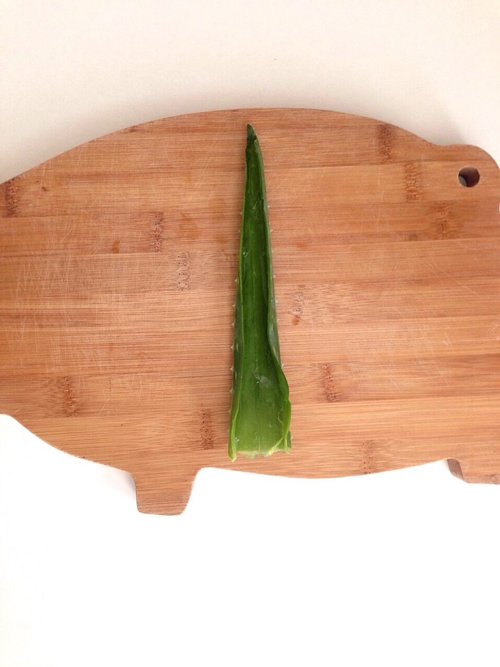 Separate the the outer leaf from the clear jelly inside.